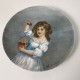 Assiette porcelaine La Jeune fille aux cerises d’apres Russell