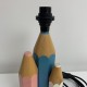 Lampe en bois polychrome vintage a decor de crayons